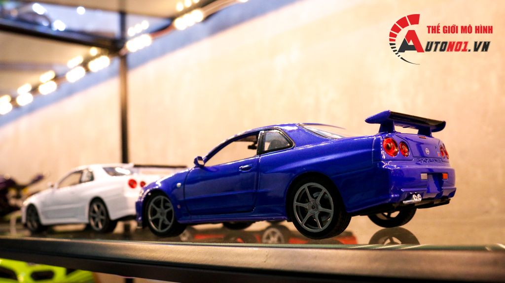 MÔ HÌNH XE NISSAN SKYLINE GT-R R34 BLUE 1:24 WELLY 7450
