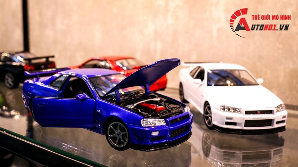 MÔ HÌNH XE NISSAN SKYLINE GT-R R34 BLUE 1:24 WELLY 7450