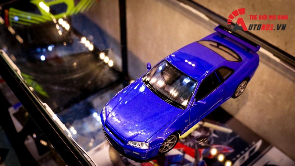 MÔ HÌNH XE NISSAN SKYLINE GT-R R34 BLUE 1:24 WELLY 7450