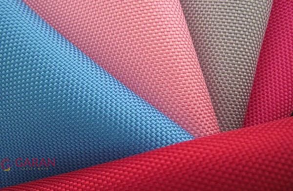 Quần áo bảo hộ lao động được sản xuất từ loại vải có chứa 100% Polyester