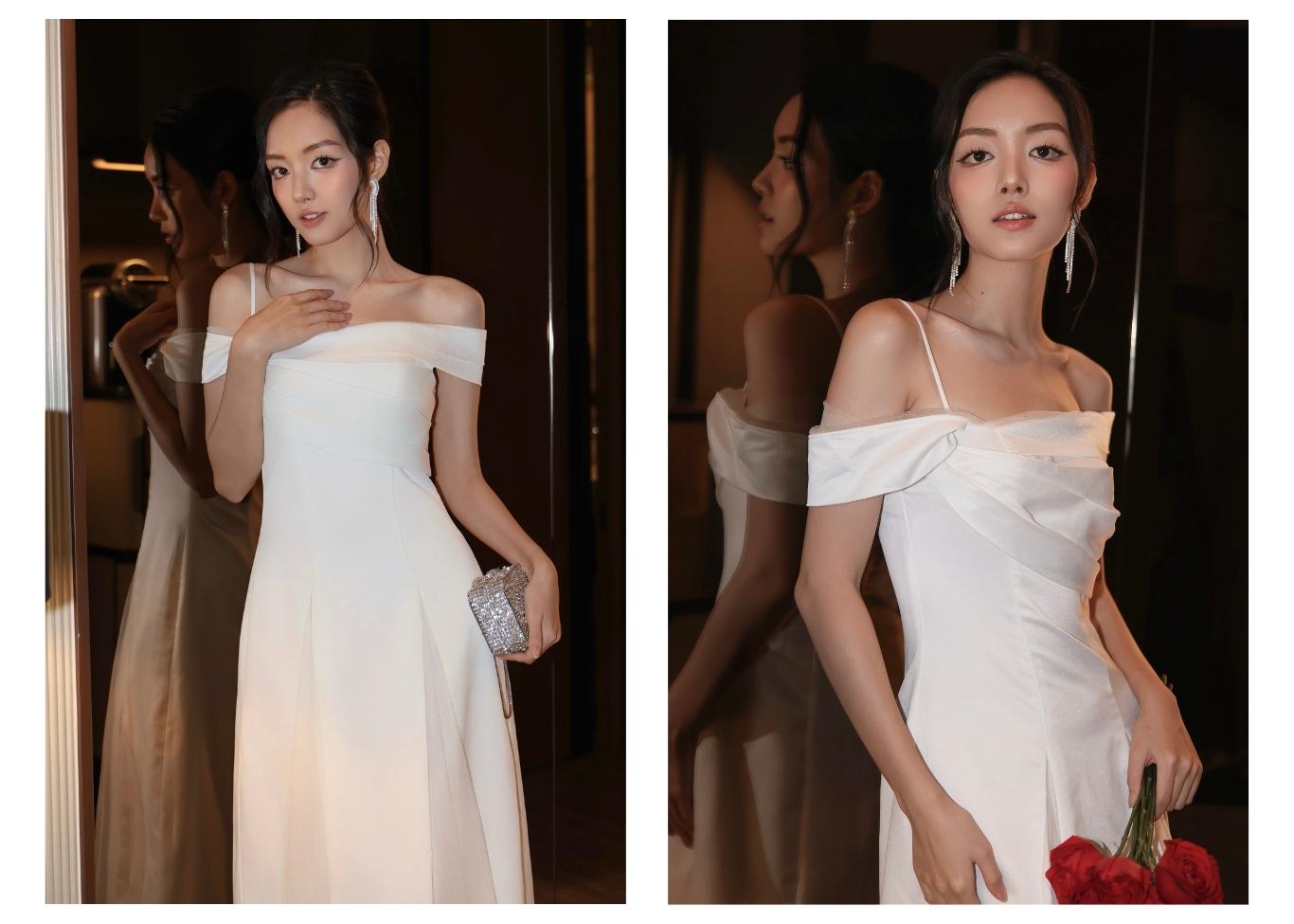 Người mẫu mặc Đầm dự tiệc dài xòe trễ vai - D3998B màu trắng