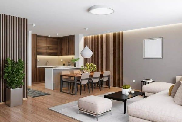 Sử dụng thảm và đèn treo để phân định khu vực phòng khách