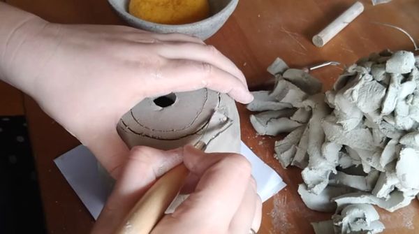 Carving ceramic planter pots