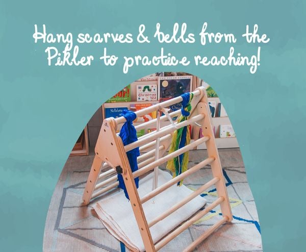 Infant practice reaching with Pikler