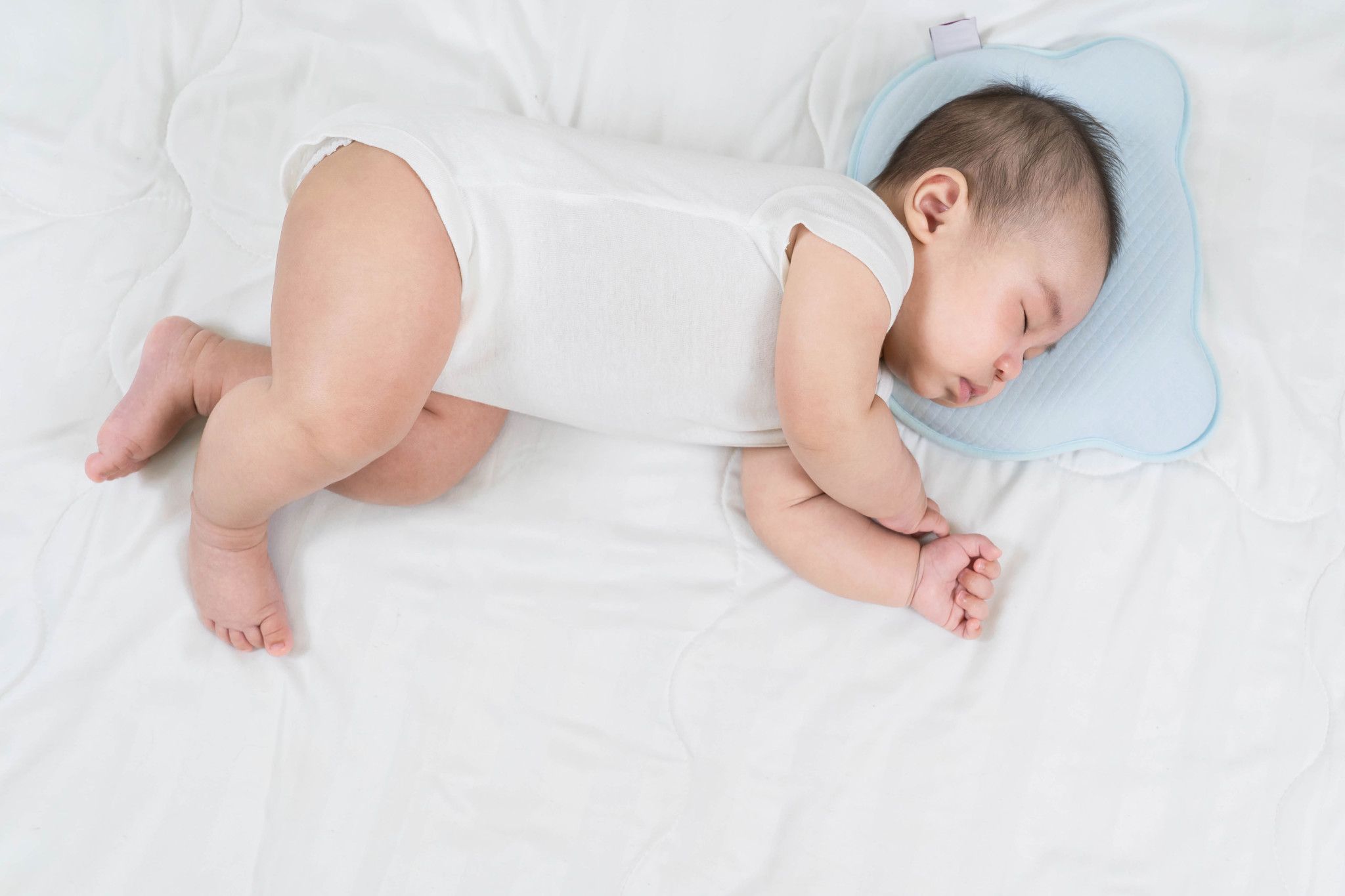 Đồ Dùng Cần Thiết Cho Trẻ Sơ Sinh: Công Nghệ TPE Nâng Tầm Gối Định Hình Đầu