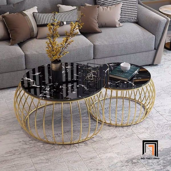cặp bàn tròn mặt đá đen khung vàng, cặp bàn sofa lồng chim