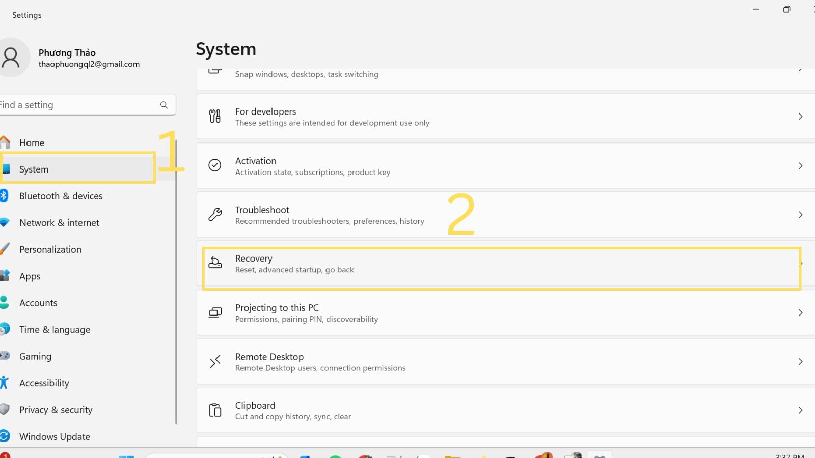Chọn System>Recovery