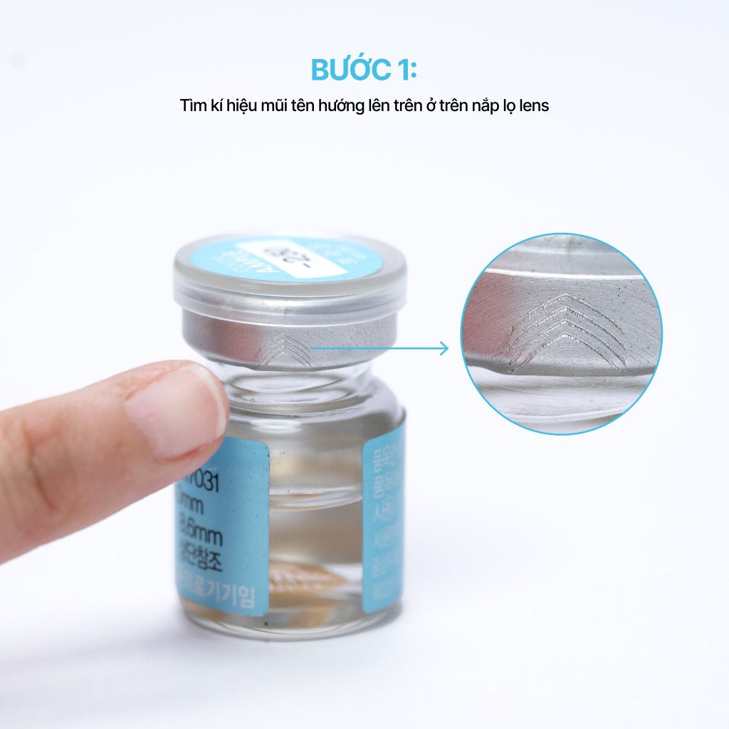 Vị trí mũi tên trên nắp lọ lens – bước xác định đầu tiên