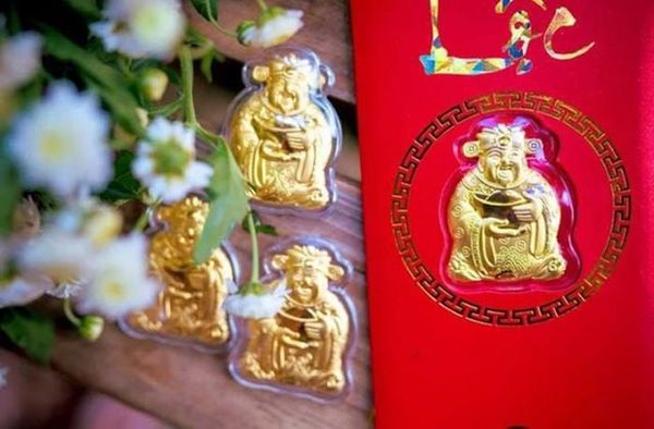 ngày vía thần tài mua vàng gì