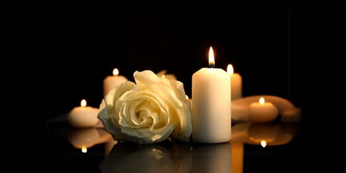 HÌnh nền đám tang Công giáo cảnh cây nến đang cháy bên cạnh hoa hồng trắng thể hiện sự thương nhớ cho latop