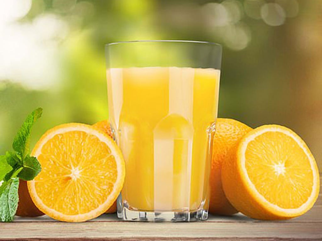 Bệnh gút uống nước cam được không?