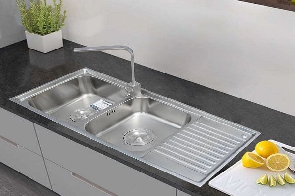 The kitchen sink is made of stainless steel
