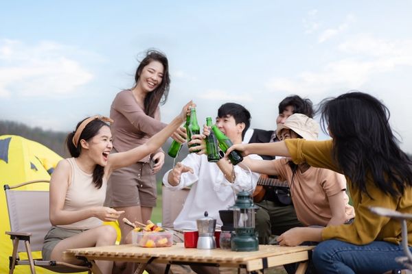 A group of young friends drinking beer