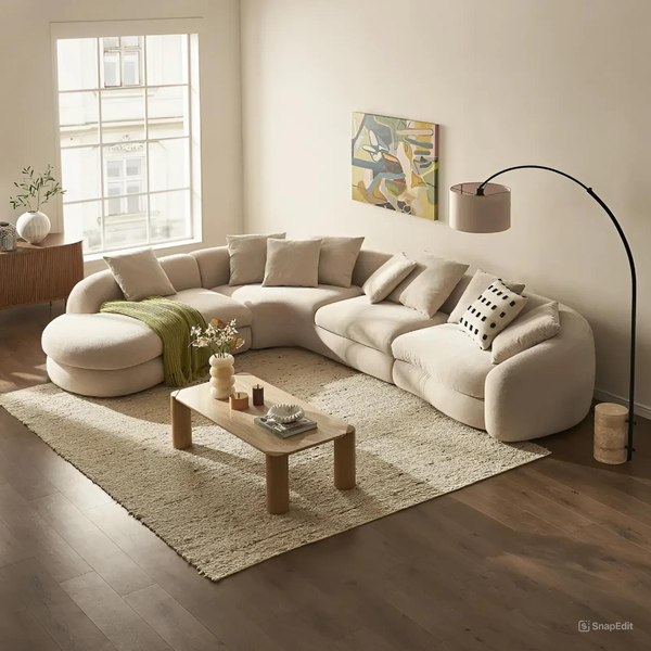Mẹo trang trí phòng khách nhà ống có cầu thang bằng bộ sofa chữ L
