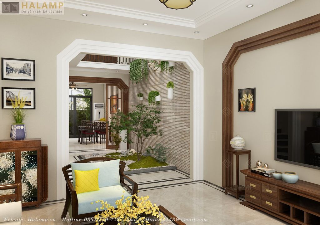 không gian phòng khách nhà liền kề có giếng trời ở giữa