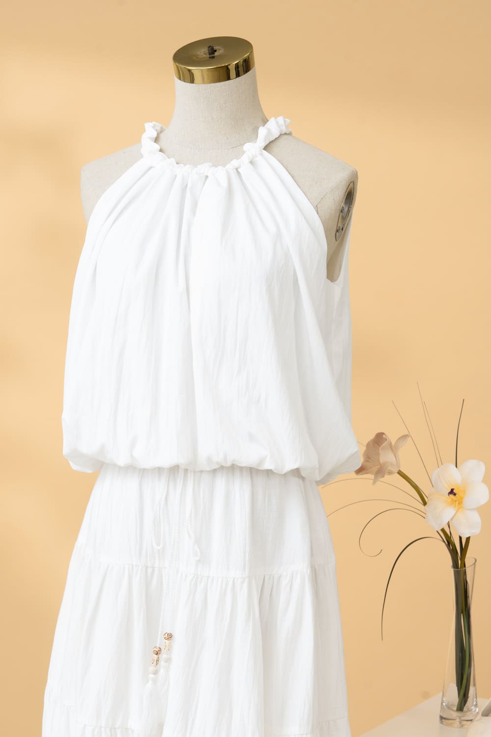 Áo thô gió cổ rút nhún dáng bom