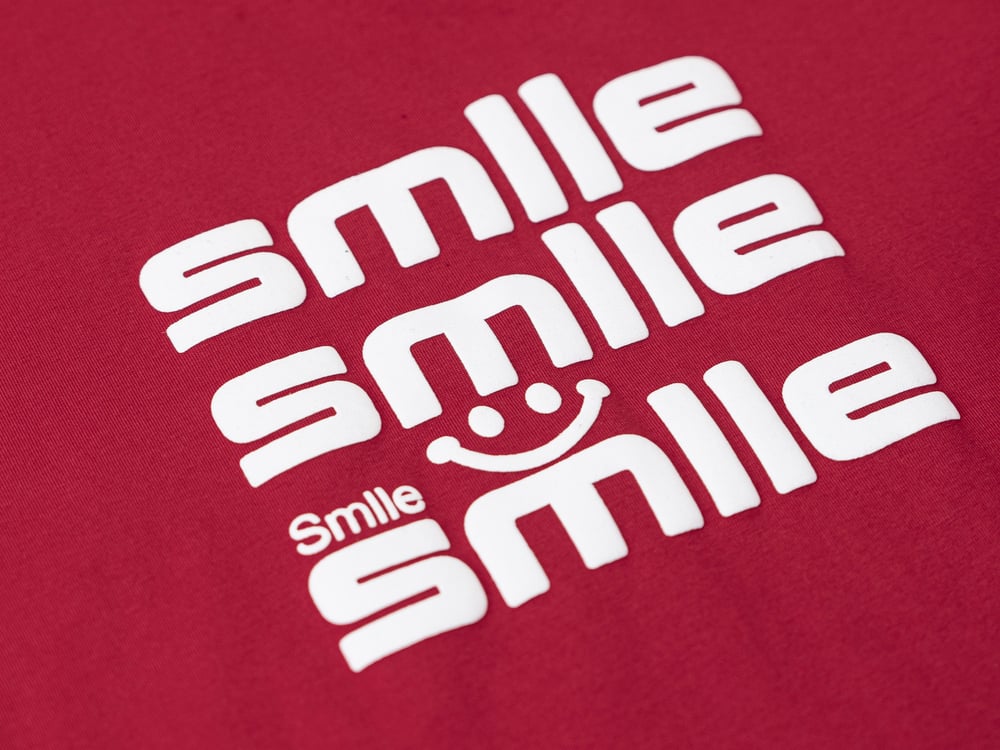 Áo phông nữ chất liệu cotton cổ tròn in chữ SMILE