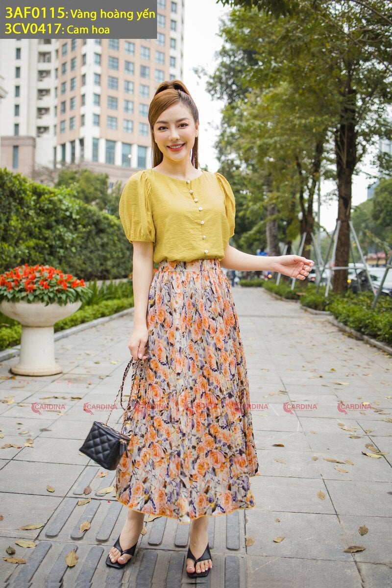 Chân váy vàng phối áo màu gì trẻ trung và thời trang nhất?
