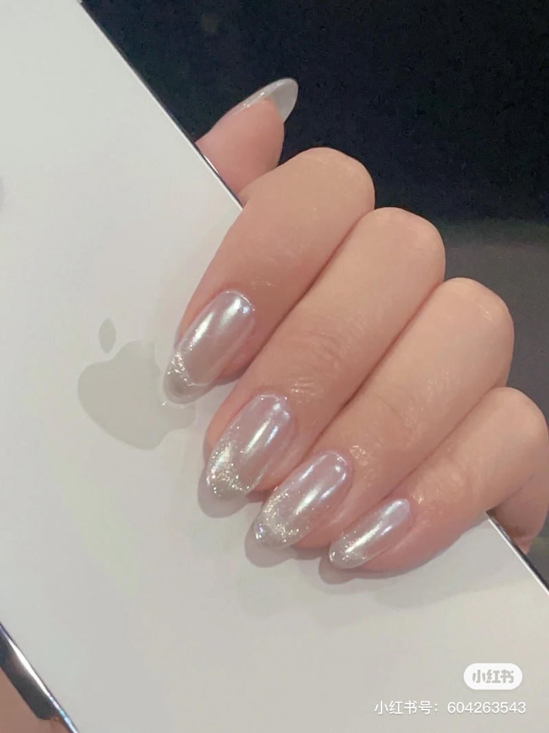 Mẫu nail mắt mèo trắng