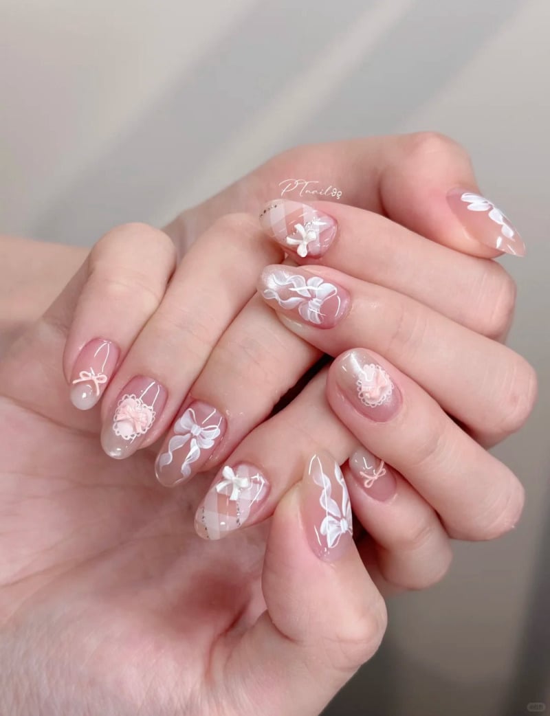 Móng tay đẹp vẽ nơ hồng ngọt ngào