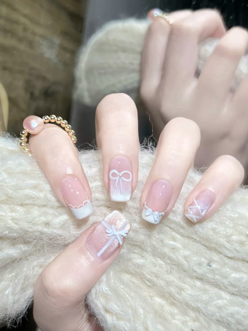 Kiểu móng tay đẹp vẽ nơ trắng tinh tế