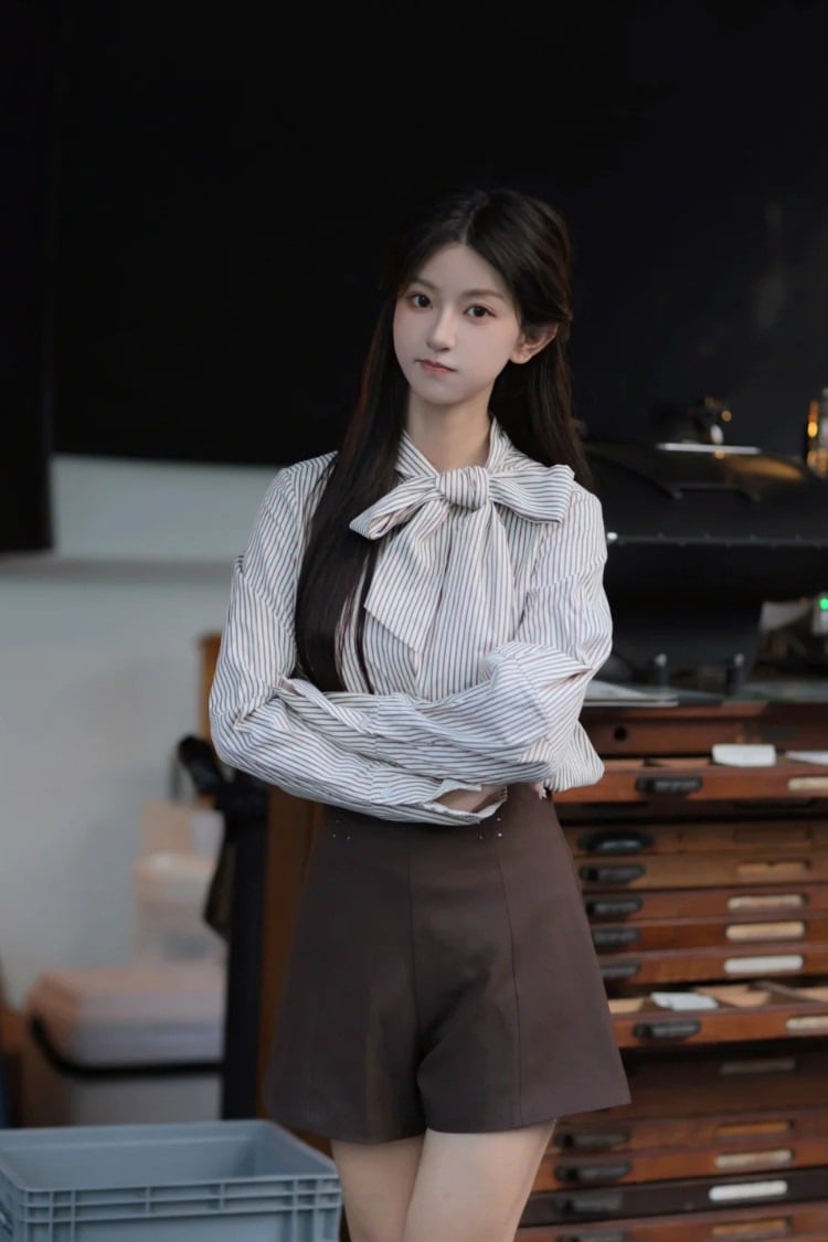 Áo sơ mi tay bồng đính nơ