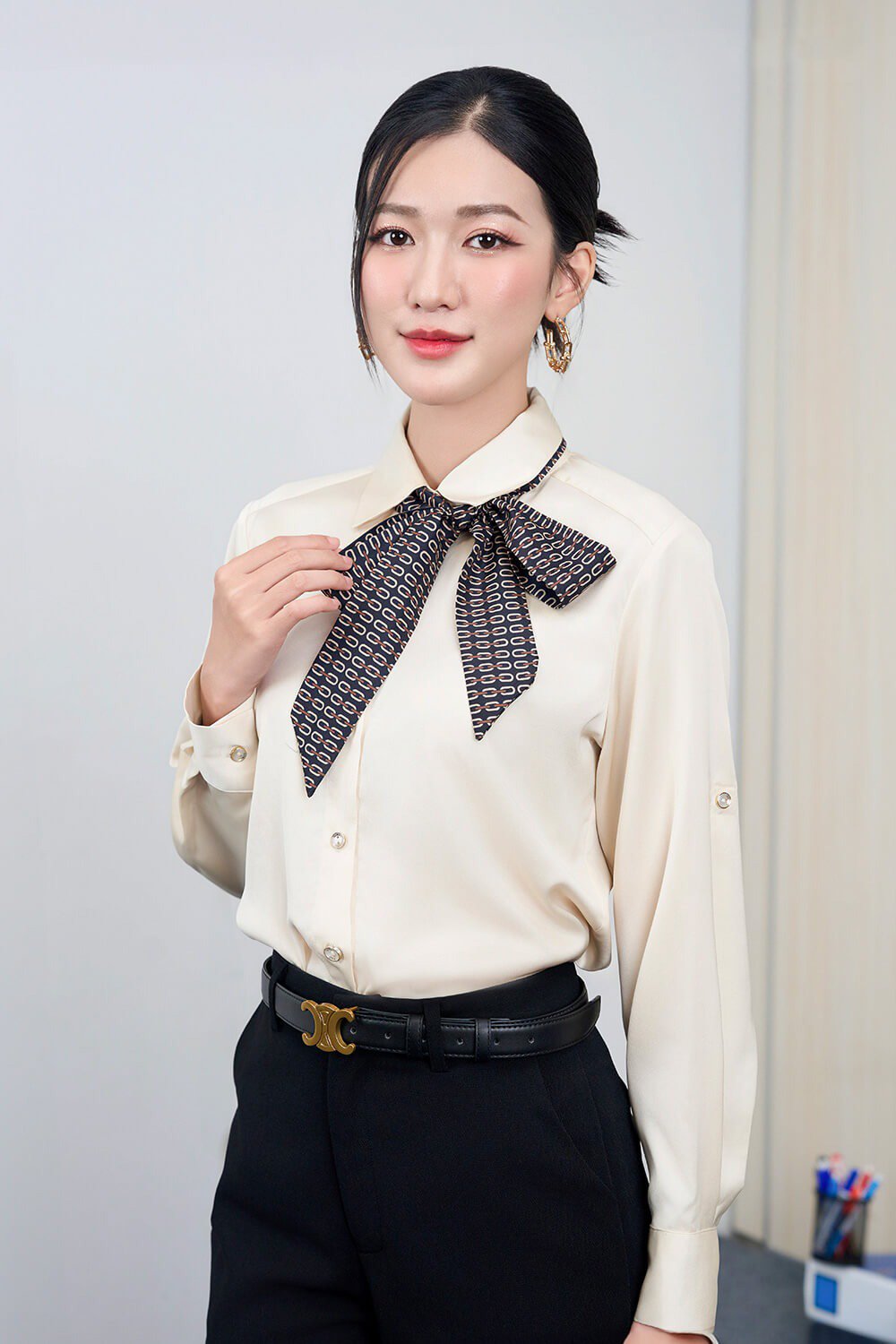 Áo sơ mi cổ đức đính nơ