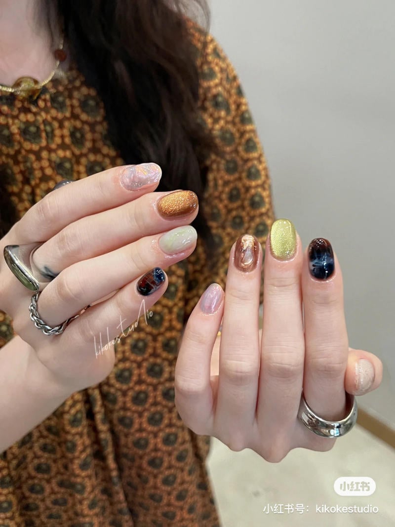 mẫu nail đôi mắt mèo đẹp nhất cho tới móng ngắn