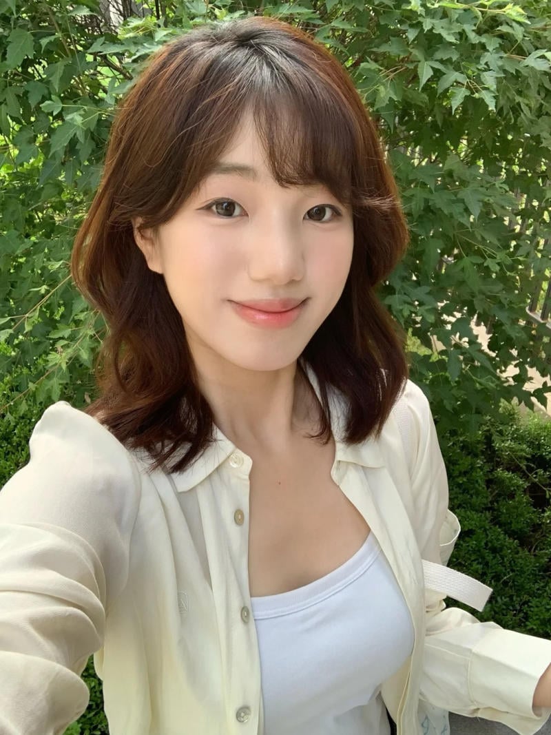 tóc xoăn lơi ngang vai