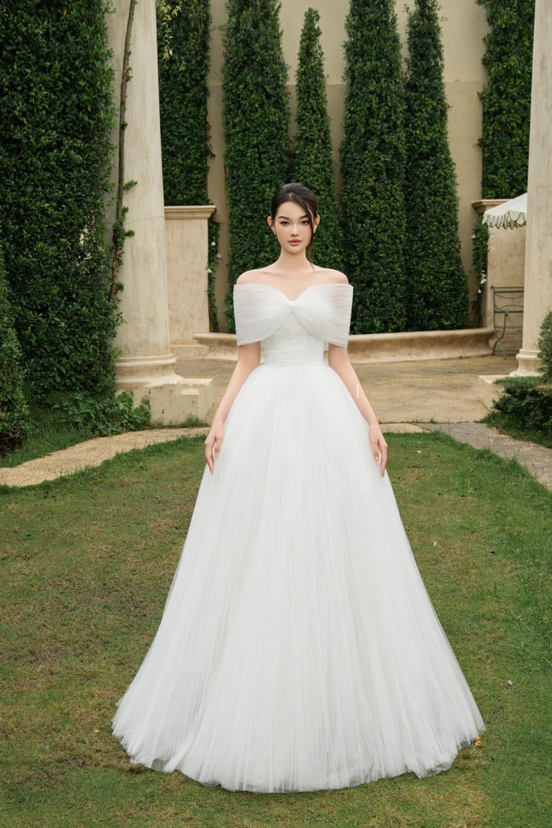 Váy Đi Bàn Dáng Xòe Bồng Màu Trắng Cúp Ngực Phối Nơ Lớn