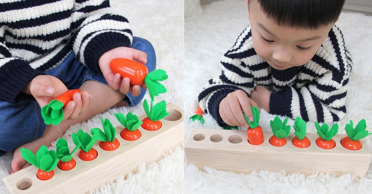 Hình ảnh trẻ chơi đồ chơi Cà rốt nhiều kích cỡ của Kinderlove
