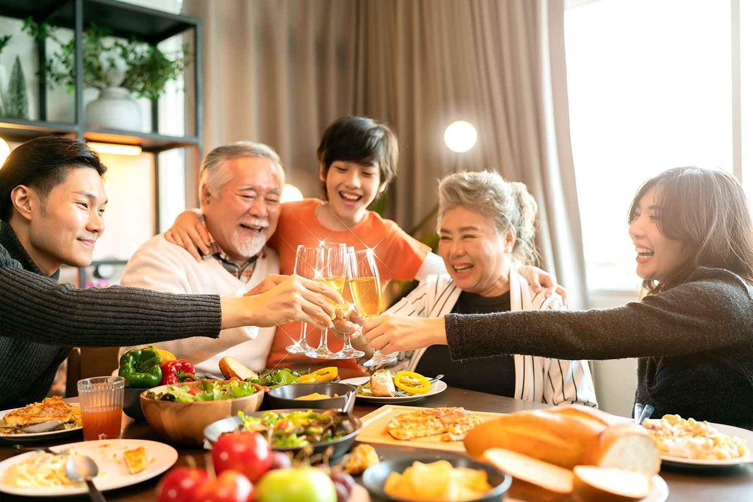 A multigenerational Vietnamese family sharing a meal together