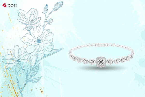 Tựa vòng hoa khoe sắc quanh cổ tay, chiếc lắc tay đính kim cương là điểm chạm dịu dàng của nghệ thuật và vẻ đẹp tinh khiết đầy cảm xúc