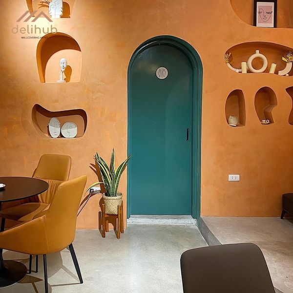 Không gian nội thất chuỗi sử dụng sơn hiệu ứng thay cho vật liệu ốp lát truyền thống, mang lại thiết kế đồng bộ, thẩm mỹ và tối ưu chi phí