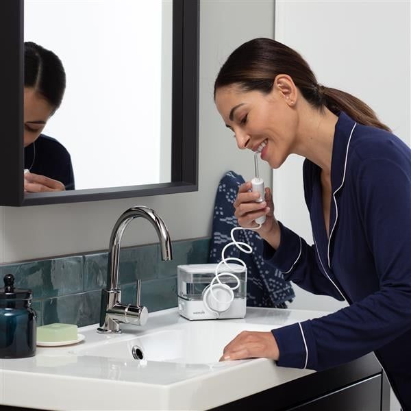 Máy tăm nước Waterpik WF-12 Loại bỏ tới 99,9% vi khuẩn mảng bám gây viêm nướu, sâu răng và hôi miệng