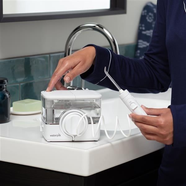Máy tăm nước Waterpik WF-12 công nghệ ION có thể sạc lại và di động cho răng