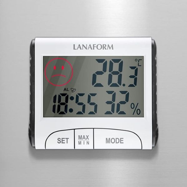Nhiệt ẩm kế kỹ thuật số Lanaform LA120701 hiển thị mặt mếu khi chỉ số không tốt