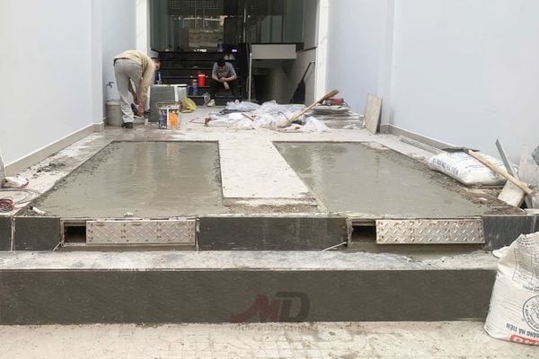 đổ bê tông mặt nền hố kỹ thuật cầu dốc ô tô âm sàn