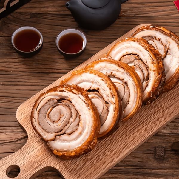 Ba Chỉ Cuộn Nướng Da Giòn của Ẩm Thực Cửu Long – món nướng hấp dẫn, da giòn rụm, an toàn.