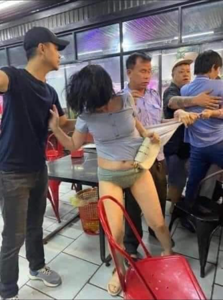 bị đánh ghen lột đồ