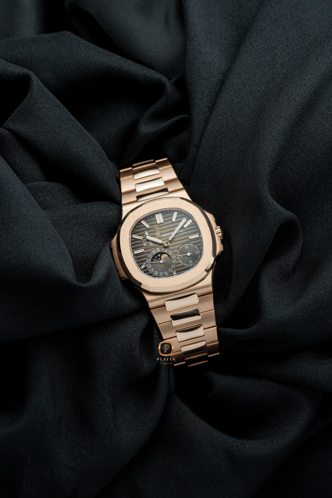 Đồng hồ Patek Philippe Nautilus 5712-1R-001 Vàng hồng Mặt số Nâu ...