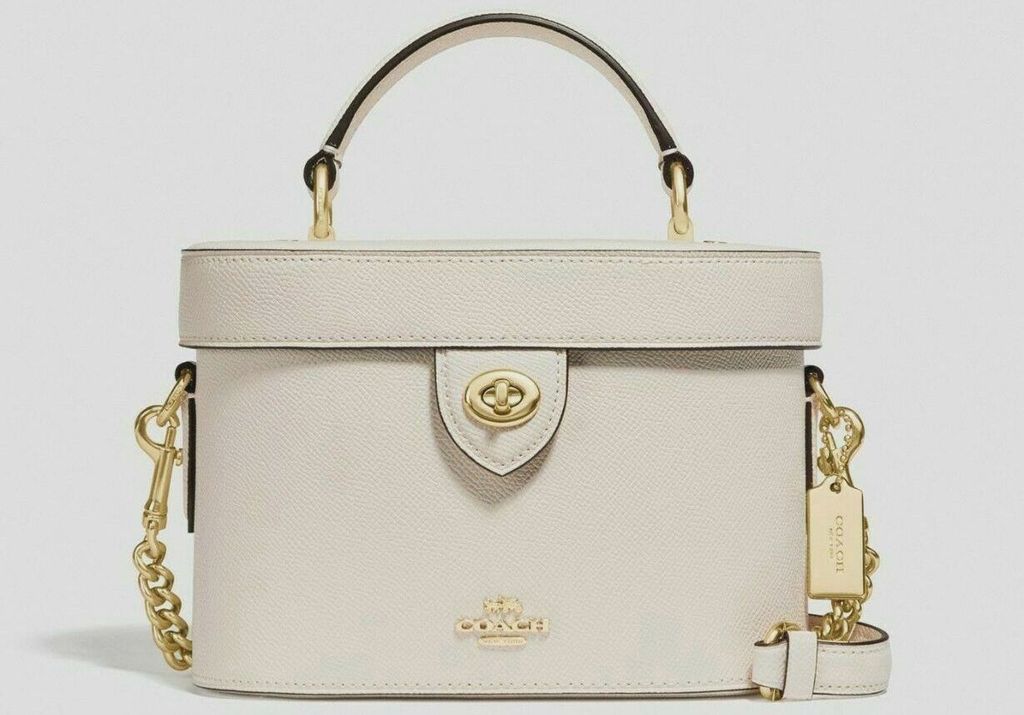 Túi Đeo Chéo Coach Turnlock In Signature Canvas