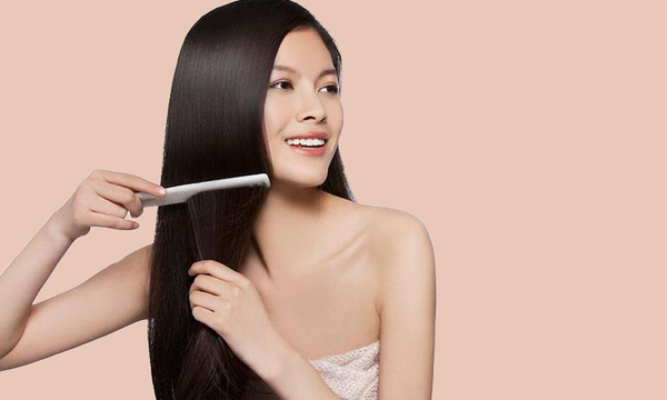 Sử dụng dầu gội giảm tóc gãy rụng