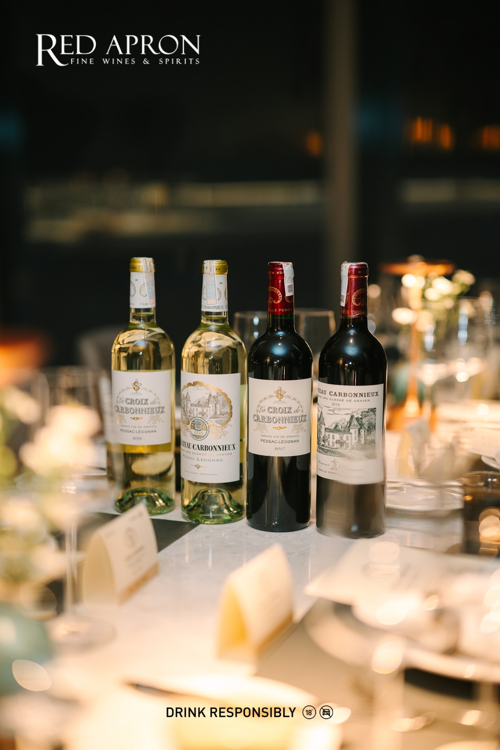 Ảnh đĩa hải sản nướng và ly rượu vang trắng Pessac-Léognan, gợi ý pairing tinh tế.