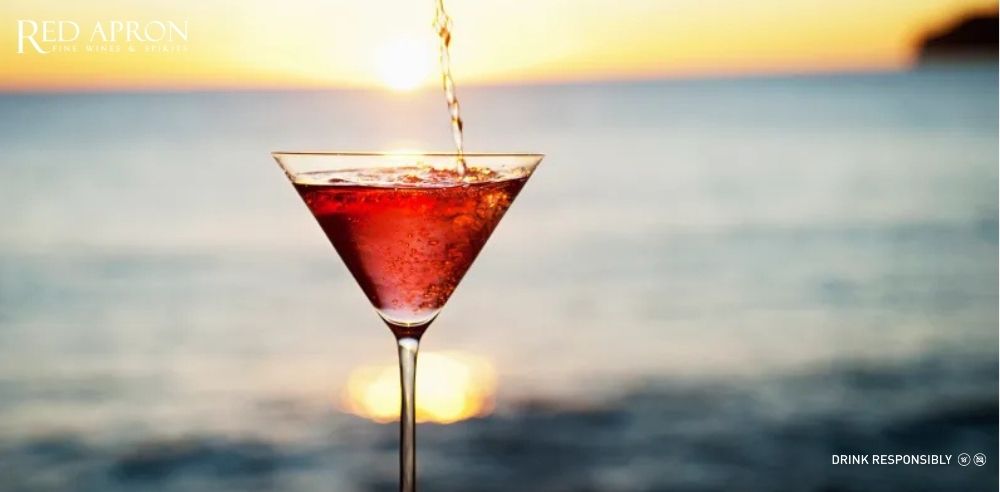 Cocktail Cosmopolitan vodka rượu Cointreau nam việt quất ly martini