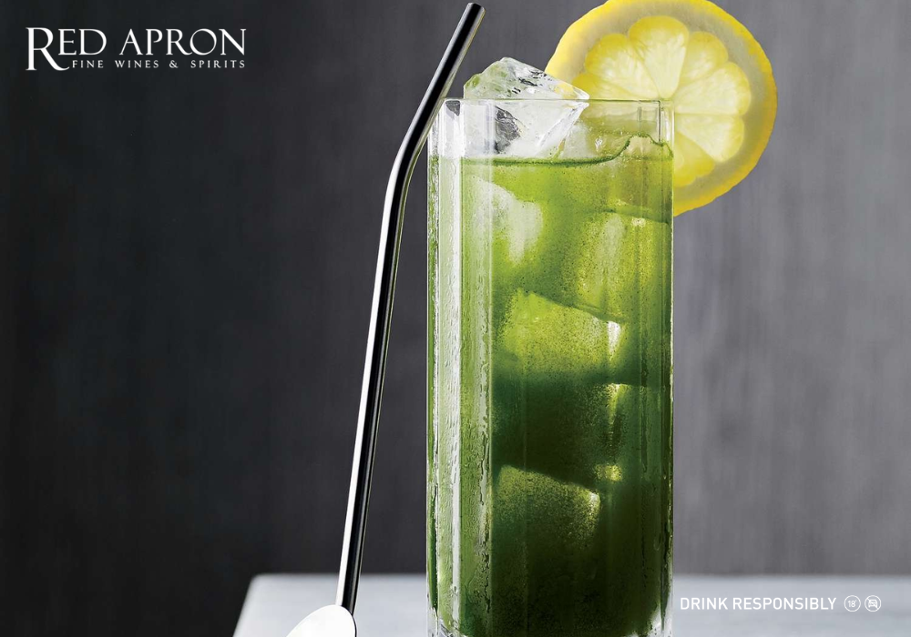 John Collins with bourbon, lemon, soda, and fruit garnish