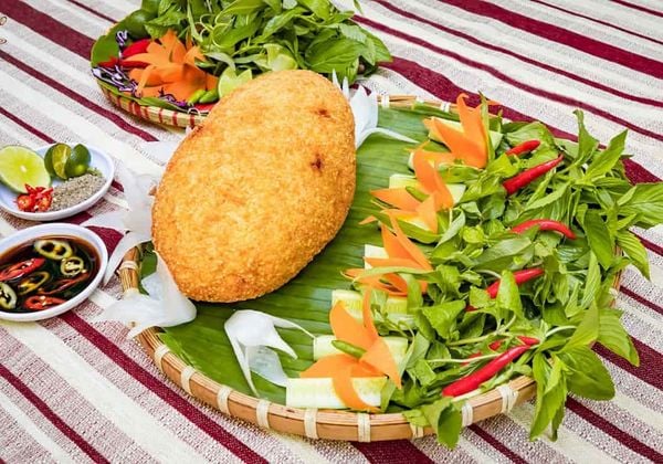 Cách làm gà bó xôi nguyên con ngon như nhà hàng