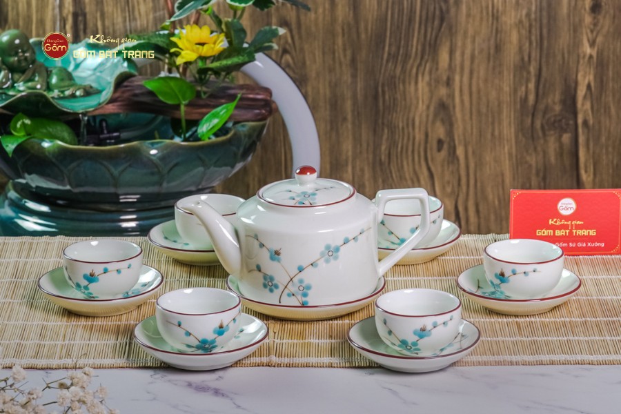 Bộ Ấm Chén Vai Cao Men Kem Vẽ Đào Xanh