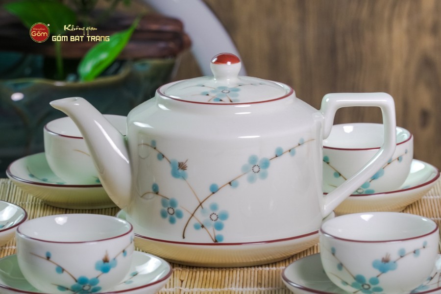 Bộ Ấm Chén Vai Cao Men Kem Vẽ Đào Xanh