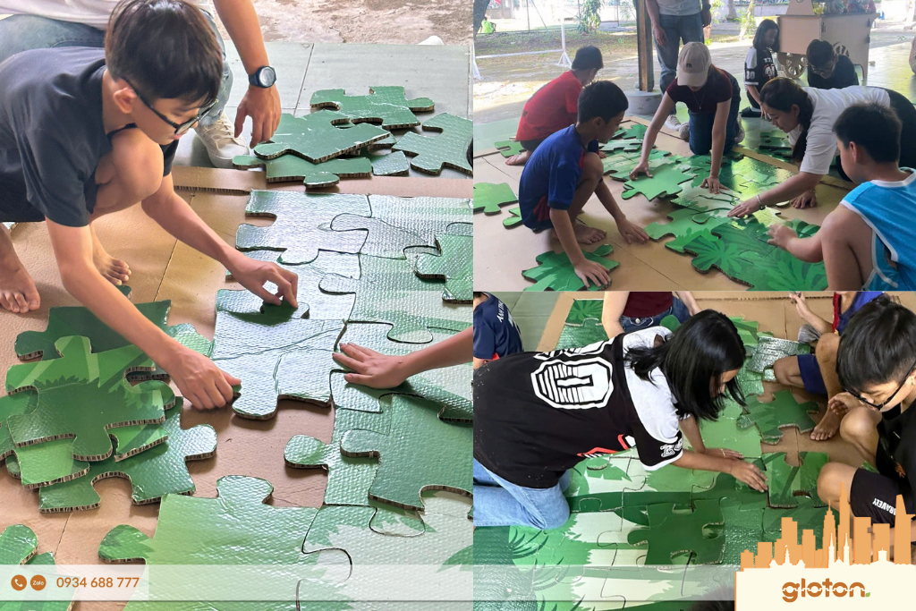 Assembling pictures from cardboard – an activity that helps children develop thinking skills and environmental awareness.